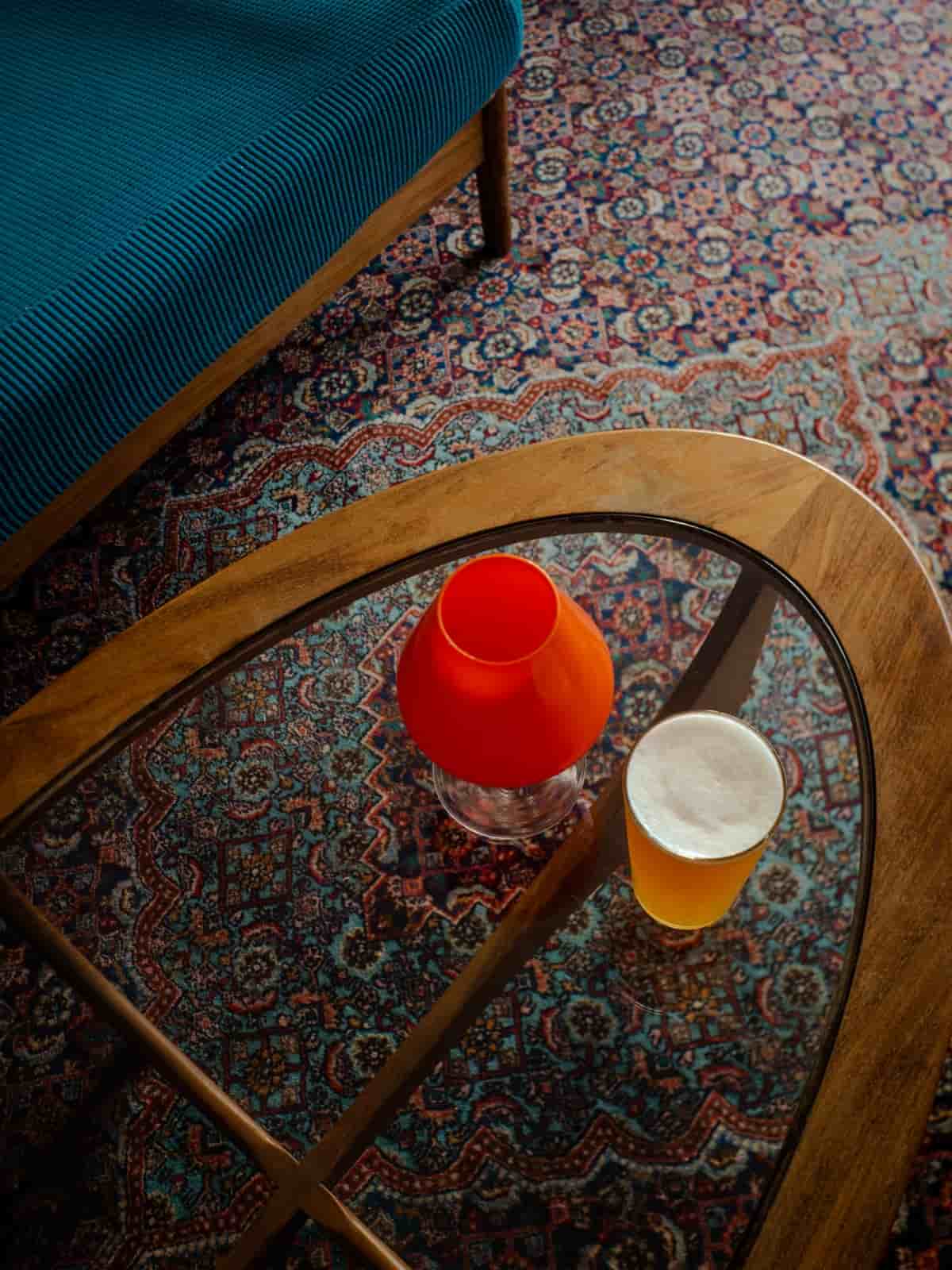 Drink on glass table.