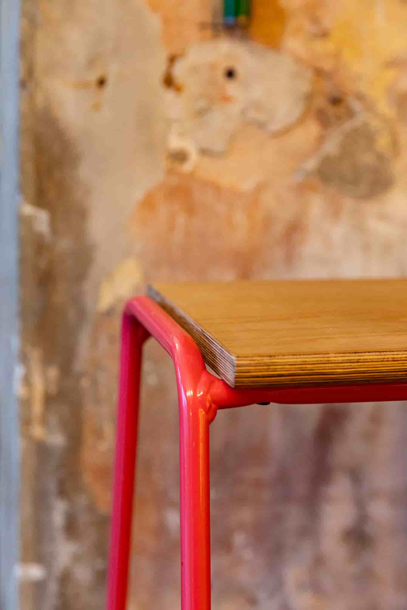 Stools at bar by Ellen Richardson