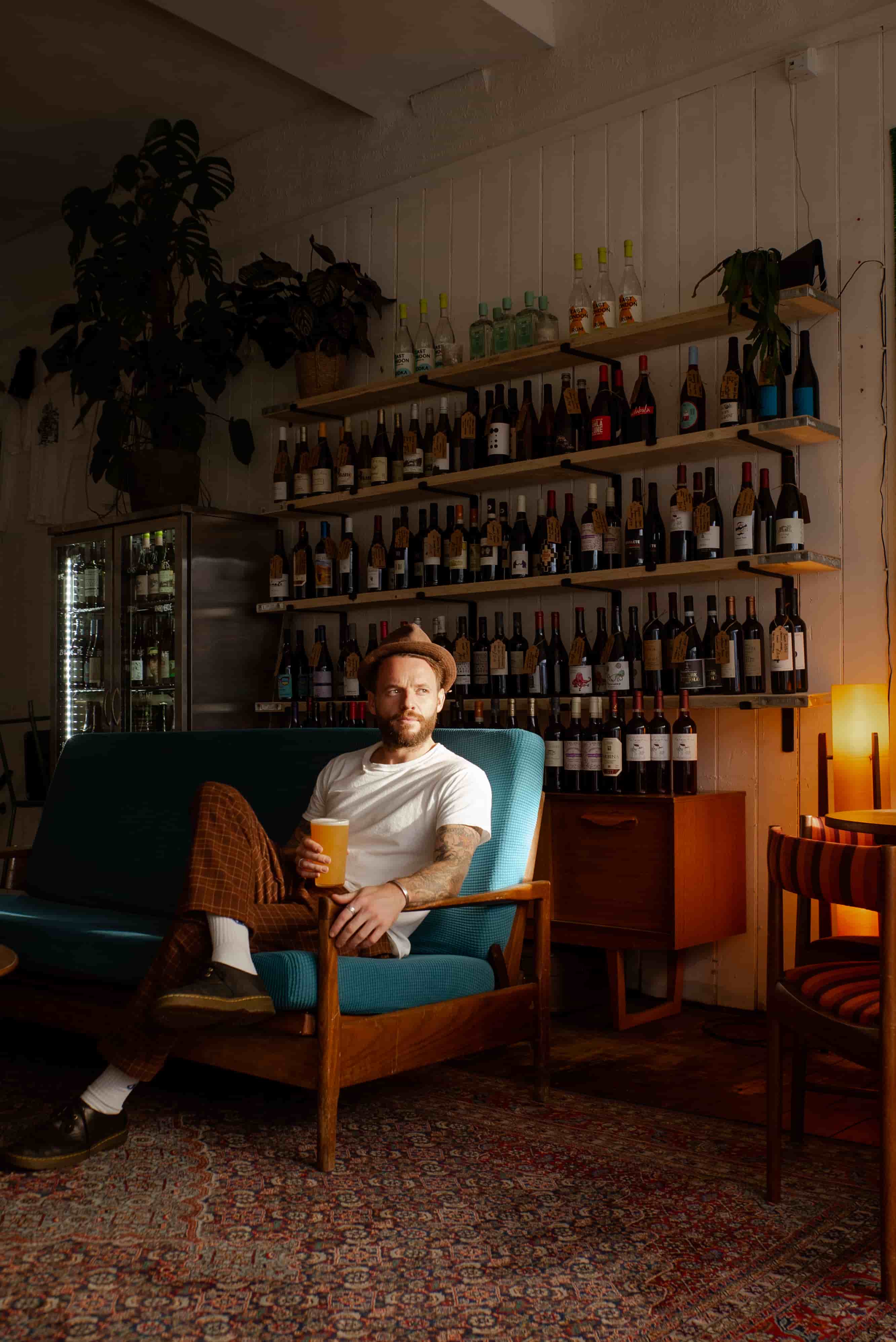 One of the pub owners with a drink.